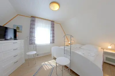 Ein Bett oder Betten in einem Zimmer der Unterkunft SL Tegeler Plate 8
