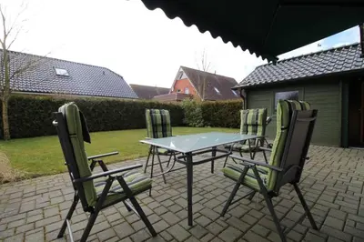 Ein Patio oder anderer Außenbereich in der Unterkunft KW19 Ferienhaus Kormoranweg
