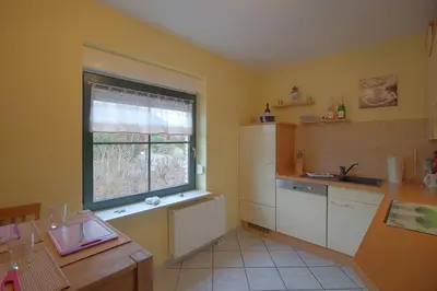 Küche/Küchenzeile in der Unterkunft KW19 Ferienhaus Kormoranweg