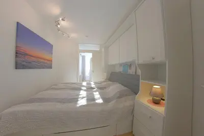 Ein Bett oder Betten in einem Zimmer der Unterkunft KW42-109 Triton mit Schwimmbad