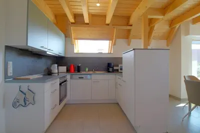Küche/Küchenzeile in der Unterkunft SV4 Mellumplate 29 Haus Falsterbo