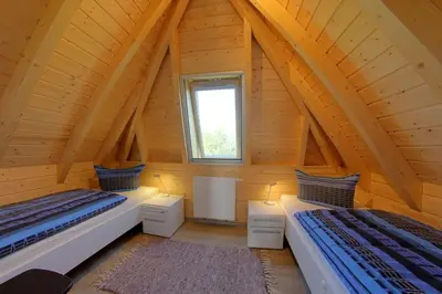 Ein Bett oder Betten in einem Zimmer der Unterkunft SV4 Mellumplate 29 Haus Falsterbo