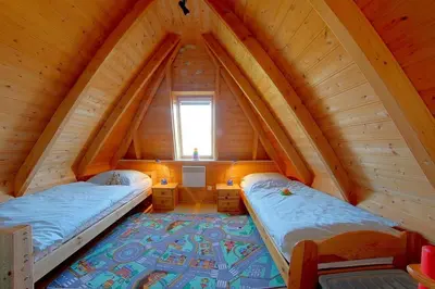 Ein Bett oder Betten in einem Zimmer der Unterkunft SV3 Lale Andersen 13
