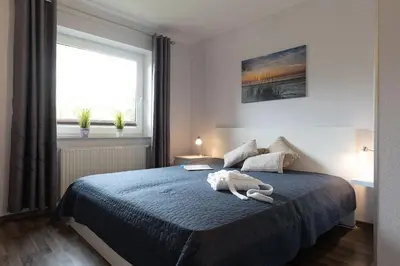 Ein Bett oder Betten in einem Zimmer der Unterkunft Lilli Marleen WE 28