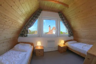 Ein Bett oder Betten in einem Zimmer der Unterkunft SR Westertill 5