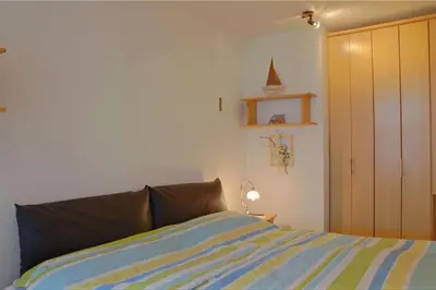 Ein Bett oder Betten in einem Zimmer der Unterkunft KW42-306 Triton mit Schwimmbad