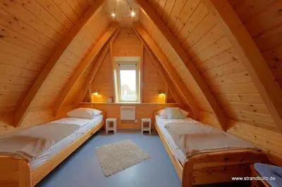 Ein Bett oder Betten in einem Zimmer der Unterkunft SV3 Westertill 7