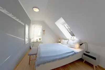 Ein Bett oder Betten in einem Zimmer der Unterkunft Sie4-11