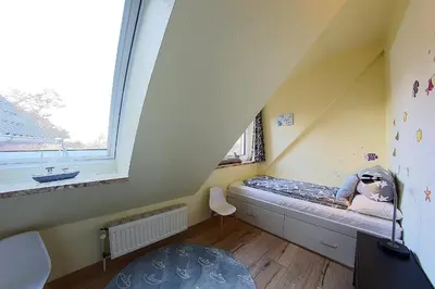 Ein Bett oder Betten in einem Zimmer der Unterkunft Sie4-11