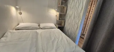 Ein Bett oder Betten in einem Zimmer der Unterkunft Terrassenhaus, FeWo 36