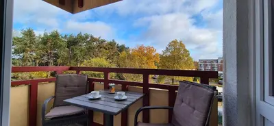 Ein Balkon oder eine Terrasse in der Unterkunft Terrassenhaus, FeWo 36