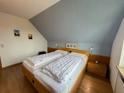 Ein Bett oder Betten in einem Zimmer der Unterkunft Haus Nordseeblick Wohnung 50 Julia