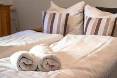 Ein Bett oder Betten in einem Zimmer der Unterkunft Neue Reihe 8 FeWo rechts