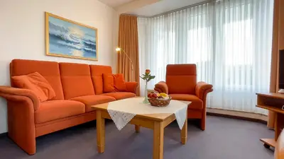 Ein Sitzbereich in der Unterkunft Haus Nordseeperle FeWo 4