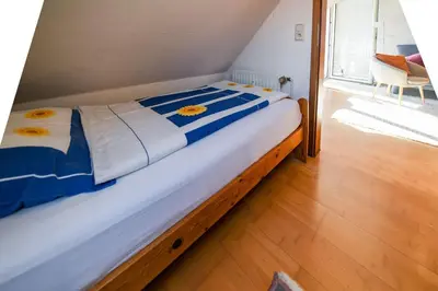 Ein Bett oder Betten in einem Zimmer der Unterkunft Land & Meer Wohnung 22