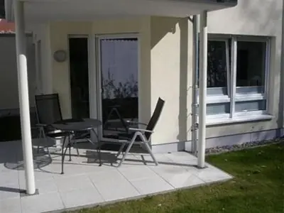 Ein Balkon oder eine Terrasse in der Unterkunft Duhner Dorfvilla, FeWo 1
