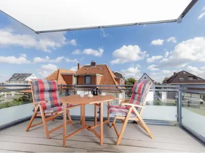 Ein Balkon oder eine Terrasse in der Unterkunft Admiralsgarten, Backbord 2