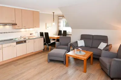 Ein Sitzbereich in der Unterkunft Mare Comfort Wohnung 8