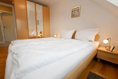 Ein Bett oder Betten in einem Zimmer der Unterkunft Mare Comfort Wohnung 8
