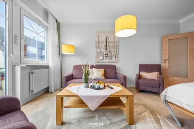 Ein Sitzbereich in der Unterkunft Ferienwohnung Hummer Büsum