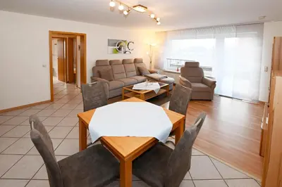 Ein Sitzbereich in der Unterkunft Mare Comfort Wohnung 6