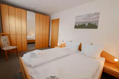 Ein Bett oder Betten in einem Zimmer der Unterkunft Mare Comfort Wohnung 6
