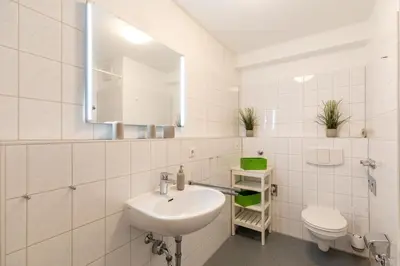 Ein Badezimmer in der Unterkunft Haus Nordseebrandung Wohnung 12