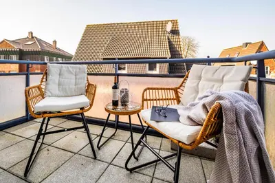Ein Balkon oder eine Terrasse in der Unterkunft Westerwarft 5