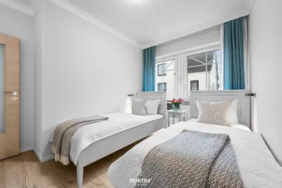 Ein Bett oder Betten in einem Zimmer der Unterkunft Ferienwohnung Sylt Büsum