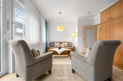 Ein Sitzbereich in der Unterkunft Ferienwohnung Sylt Büsum