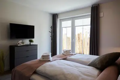 Ein Bett oder Betten in einem Zimmer der Unterkunft Kattegat Apartment 03