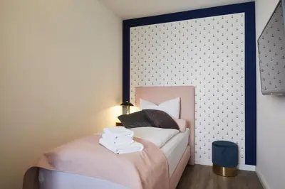 Ein Bett oder Betten in einem Zimmer der Unterkunft Kattegat Apartment 07