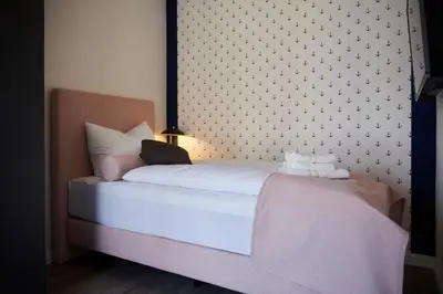 Ein Bett oder Betten in einem Zimmer der Unterkunft Kattegat Apartment 20