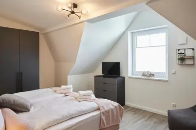 Ein Bett oder Betten in einem Zimmer der Unterkunft Kattegat Apartment 23