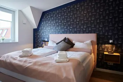 Ein Bett oder Betten in einem Zimmer der Unterkunft Kattegat Apartment 26