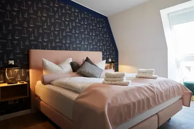 Ein Bett oder Betten in einem Zimmer der Unterkunft Kattegat Apartment 27
