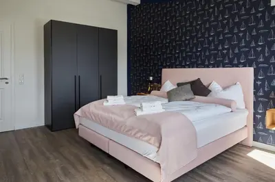 Ein Bett oder Betten in einem Zimmer der Unterkunft Kattegat Apartment 29