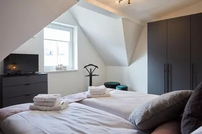 Ein Bett oder Betten in einem Zimmer der Unterkunft Kattegat Apartment 32
