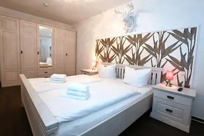 Ein Bett oder Betten in einem Zimmer der Unterkunft Bernstein Mare Luxor 02