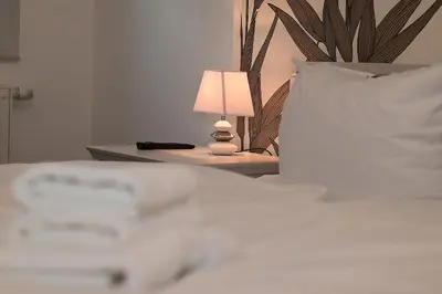 Ein Bett oder Betten in einem Zimmer der Unterkunft Bernstein Mare Luxor 07