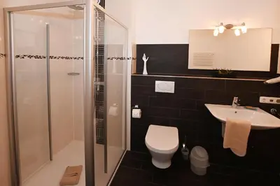 Ein Badezimmer in der Unterkunft Bernstein Mare Luxor Penthouse 01