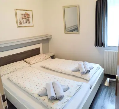 Ein Bett oder Betten in einem Zimmer der Unterkunft Haus Nordlicht I