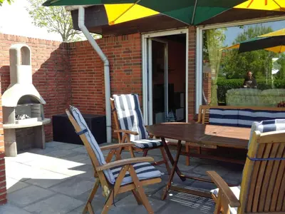 Ein Patio oder anderer Außenbereich in der Unterkunft Holiday Home mit Garten- Grill und Terrasse by Interhome