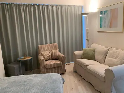 Ein Sitzbereich in der Unterkunft Apartment Wohnung in Duhnen und Meerblick by Interhome