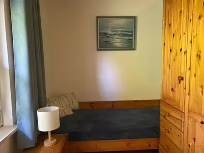 Ein Bett oder Betten in einem Zimmer der Unterkunft Holiday Home Ferienhaus De Seekobb - Direkt an der Nordseeg-Spitze by Interhome
