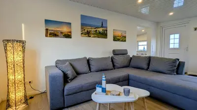Ein Sitzbereich in der Unterkunft Ferienwohnung Dennis