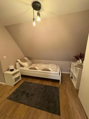 Ein Bett oder Betten in einem Zimmer der Unterkunft Fifty One - Ferienhaus