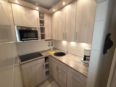 Küche/Küchenzeile in der Unterkunft Strandhochhaus E3