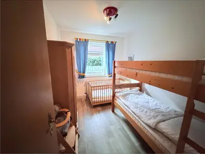 Ein Bett oder Betten in einem Zimmer der Unterkunft Hamburger Str 24 FeWo 2