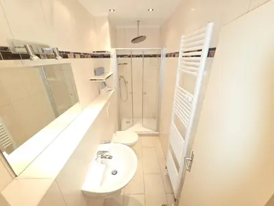 Ein Badezimmer in der Unterkunft Strandhochhaus Wohnung E3
